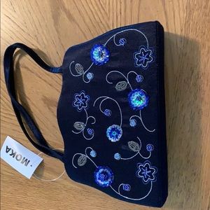 Brand new navy blue evening bag.